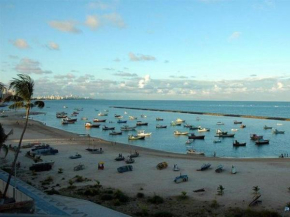 Flat na praia de Candeias